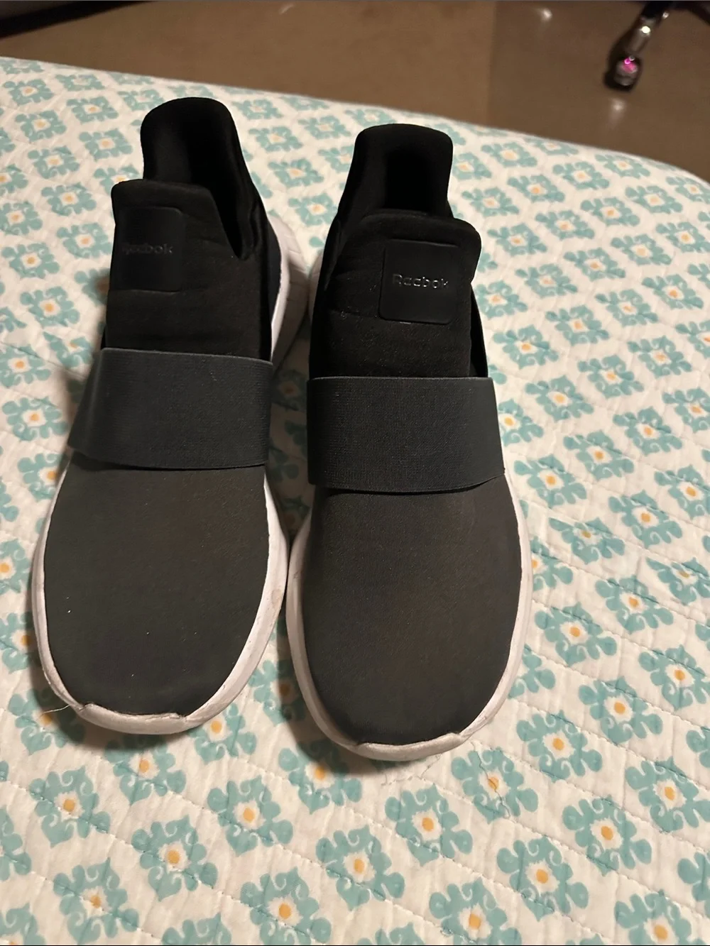 Women’s Reebok Slip-On Athletic Sneakers in Black and White